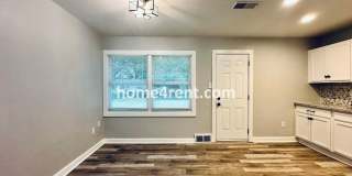 Lovely Three Bedroom Home in KCMO and an Updated Kitchen  w/ Granite and SS Appliances, including a Fenced Yard! Gallery 8