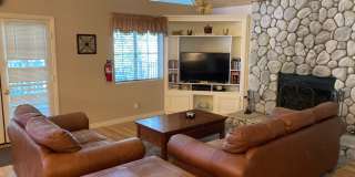 Location! Location! Terrific Four bedroom Three Bath Home with Two Car Garage including Lake Rights! Gallery 4