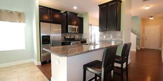 Gorgeous END UNIT 3 bedroom town home in desirable Harpers Mill with Garage and Primary on main with walk-in shower!! Gallery 5