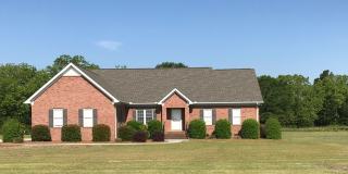 4 bd 2 bth all brick w/ 2 car garage located on a 1 acre lot - lawn care, water, trash, washer/dryer included Gallery 1