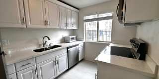 Updated 2-Bedroom Condo with Water Views, 2 Parking Spaces & Poolside Location Gallery 6