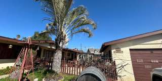 Cozy 2-Bedroom Duplex with Fireplace  Sunroom in Vista – Don’t Miss Out! Gallery 1