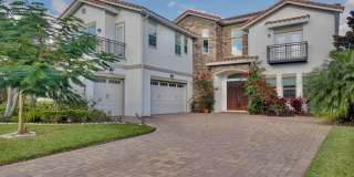 Stunning 4/5 Executive Pool Home in the Guard-Gated Golf Course Community of Eagle Creek - Orlando! Gallery 1