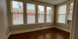 Central Gardens home with 4BR/2ba up w office/flex space. Wrap around, covered front porch! Pets are owners approval. Gallery 20