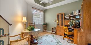 Experience Bell Tower Park. GATED ground floor 2 Bed 2 Bath Den 1 Car Garage Condo. Gallery 16