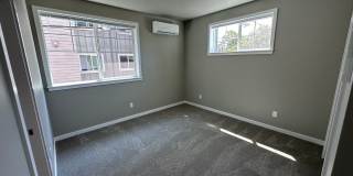 4 Bedroom / 4 bath New Townhome. Every bedroom is its own Master Suite with your own full bathroom, walk in closet and A/C unit. Full-size washer and dryer in your unit. Gallery 27