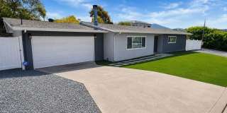 Updated 3 Bedroom Home with Modern Finishes, Private Yard & 2 Car Garage Gallery 1