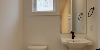 Live Where Style Meets Convenience – 2BR Townhome + Garage Gallery 11