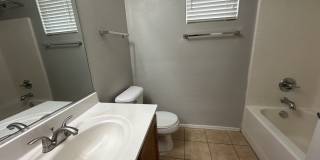 Single-level 3-bedroom home in a desirable Chandler location featuring a 2-car garage and tile roof and wood plank flooring throughout Gallery 31