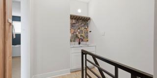 Detached Luxury 4BR/3B Retreat with Skyline Rooftop Deck, Wet Bars, Driveway & Massive Yard Gallery 21