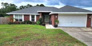 Adorably Styled and Updated 4 bedroom 2 bath Brick home located in Pace Community of La Floresta! Gallery 1
