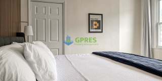 Furnished Elegant 3-Bedroom, 2.5 Bath Home with Hardwood Floors & Central A/C Gallery 26