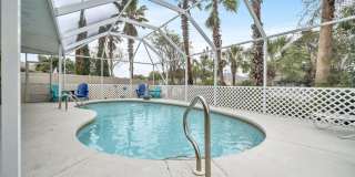 Gorgeous 4 bedroom pool house for rent w/ deeded beach access + pool & yard service included in the rent! Gallery 52