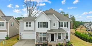 Rare 2023-built home on an oversized 0.35-acre lot in one of Waxhaw's most sought-after communities — zoned for the 9/10-rated Waxhaw Elementary School and move-in ready today. Gallery 8