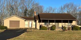 Well-Maintained 2-Bedroom Home with Attached Garage and Walkout Basement! Gallery 1