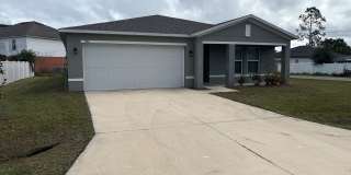 Beautiful 4-Bedroom Corner-Lot Home in Poinciana with 2-Car Garage Gallery 1