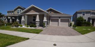 This charming 4 Bedroom, 3 Bath Single Family Home For Rent at 5055 Hatchineha Ct, FL 34787 Gallery 1