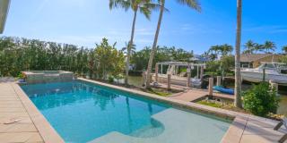 ***STUNNING POOL HOME***4BEDS / 4BATHS***GOLDEN SHORES***FURNISHED SEASONAL RENTAL*** Gallery 1