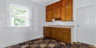 Charming 3BR Home with Classic Woodwork, Porch & Bonus Attic Space Gallery 18