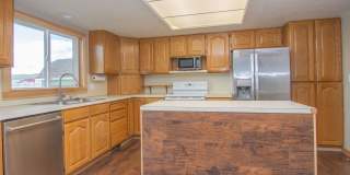Spacious 3 Bed 2 Bath Brick Home with RV Parking, Shop Space & Large Yard in Tremonton! Gallery 15