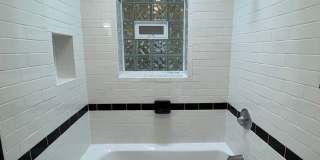 Charming 1928 Row Home for Rent with Modern Amenities — 3 Bedroom 2 Full Bath w/ 2 Half Baths, 2 Kitchens, located in Kingman Park, Near DC Armory & Eastern Market Gallery 31