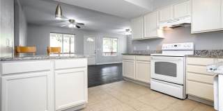 Stunning Renovation - New Hardwood flooring, tile in Kitchen. Granite countertops, breakfast bar Gallery 14