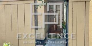 2/2 Condo with 1 Car Garage, Wrap Around Patio, Fireplace, Granite Kitchen and Community Pool Gallery 1