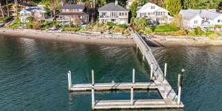 Impeccable Low Bank Bainbridge Waterfront Home with Private Dock Gallery 1