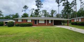 Spacious 3 Bedroom Brick Home with Open Floor Plan, Large Fenced Yard & Carport in Valdosta Gallery 1