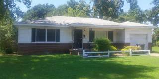 Corner lot w/mature trees, gorgeous hardwoods, small bonus room off kitchen-perfect for an office. Gallery 1