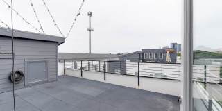 Stunning South End end unit townhome in the modern and amazing Southpoint community. Gallery 38