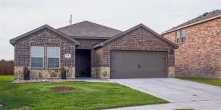 Boasts 4 bedrooms with 2 baths on a premier lot. As you enter the home, you will be greeted with an open entry way that leads to the open concept living room Gallery 1