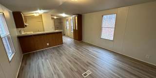 Two bedroom single wide on private lot off Colonial Hwy! Gallery 1