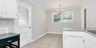 Discover the charm of this brick ranch nestled in the heart of Madison Park Gallery 19