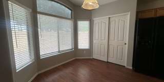 Single-level 3-bedroom home in a desirable Chandler location featuring a 2-car garage and tile roof and wood plank flooring throughout Gallery 16