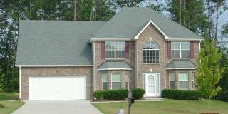 EXECUTIVE HOME IN SWIM COMMUNITY NEAR CAMP CREEK! Gallery 1