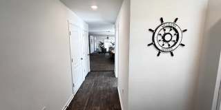 Picturesque Waterfront 4-Bedroom Home with Premium Amenities + 3 Car Garage! Community Amenities! Gallery 6