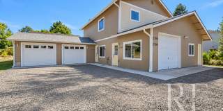 Newly Built 2-Bedroom Upper Duplex with Garage, AC & Designated Parking Gallery 1