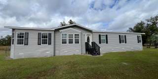 Spacious 4-Bedroom, 2-Bath Manufactured Home for Rent in Mayo, FL – 2350 Sq Ft Gallery 1