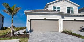 Golf Transfer New Construction 3-Bedroom 2-Bathroom First Floor Coach Home in the desirable Wellen Golf and Country Club – Minutes from Downtown Wellen Park and Braves Stadium! Gallery 1