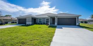 Newer Construction Duplex in Lehigh Acres – 2 Bed / 2 Bath with Attached Garage Gallery 1