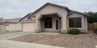 Single-level 3-bedroom home in a desirable Chandler location featuring a 2-car garage and tile roof and wood plank flooring throughout Gallery 3