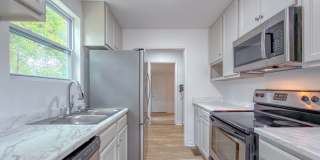 RENOVATED 4/2 in Walkable Location, Stainless Steel Appliances, & Garage/Workshop! Available NOW for $1850/month! Gallery 13
