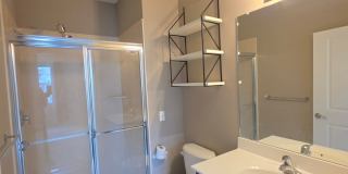 Beautiful 2nd floor (with elevator services) condominium: 2-bed, 2-bath, beautiful kitchen, bonus room, laundry room & deck! Gallery 16