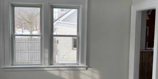 Single Family Home 3 bedroom 1 bath new paint flooring with basement fenced in yard Gallery 7