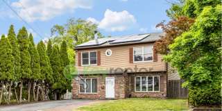 Spacious 4 Bedroom Home in Maywood with Fenced Yard, Office & Solar Panels Gallery 1