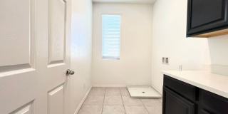 Beautiful 4-Bedroom Home with Dual Primary Suites in Henderson! Gallery 27