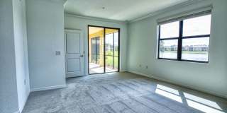Annual Unfurnished Rental – Coach Home 3 Bedrooms, 2 Baths, 2 Car Garage, with Resort Like Amenities – Gran Paradiso Community! Gallery 7