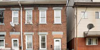 Newly renovated 2 Bed, 1 Bath w/ Bonus Room, Central AC, Laundry - Available October 1st! Gallery 1