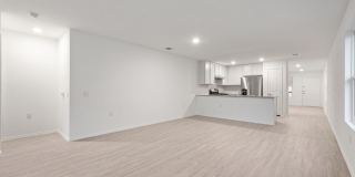 This beautiful single-story home has 4 bedrooms, 2 baths, vinyl flooring throughout, an open floor plan Gallery 9
